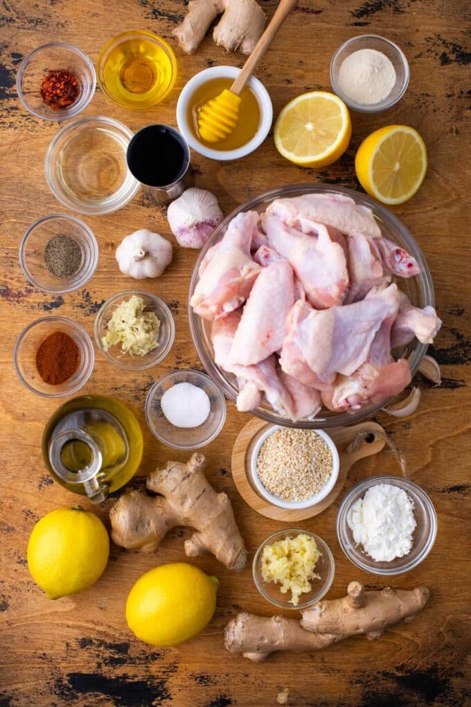 honey garlic chicken wings ingredients in bowls on a table