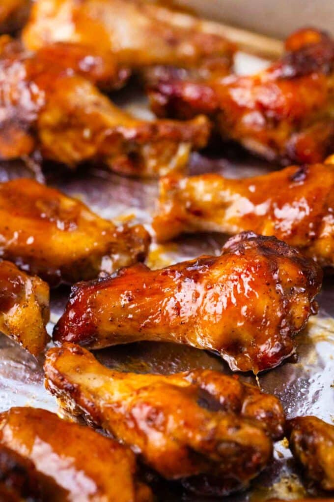 crispy oven-baked honey garlic chicken wings on a baking sheet