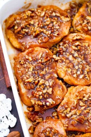 overhead shot of pecan pie french toast casserole topped with pecan pie mixture