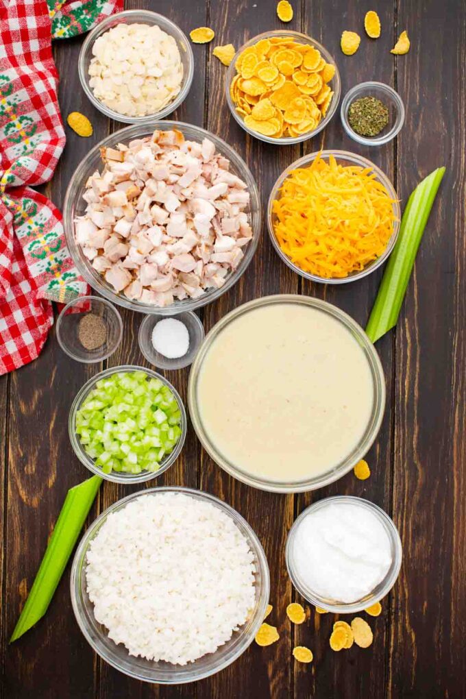 overhead shot of rotisserie chicken casserole ingredients in bowls on a table