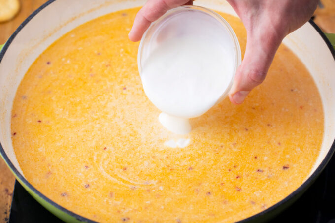 Adding sour cream to cheese cause.