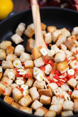 sautéing croutons with garlic and spices