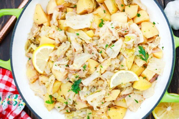 Overhead shot of a pan with cabbage and potatoes.