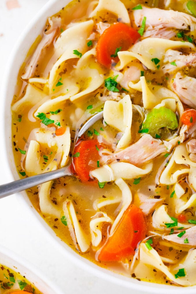 Close shot of chicken noodle soup.