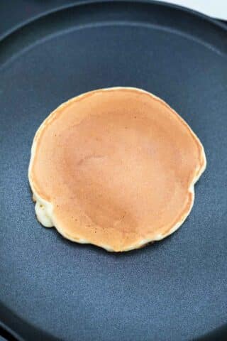 cooking a pancake on a non stick skillet