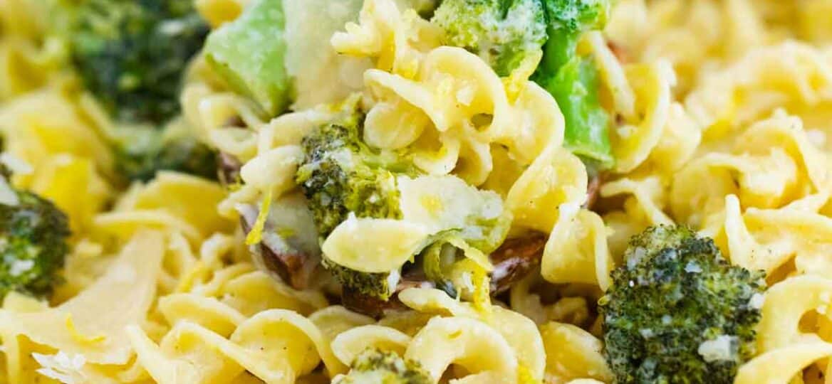 close shot of lemon broccoli pasta with a serving spoon in it