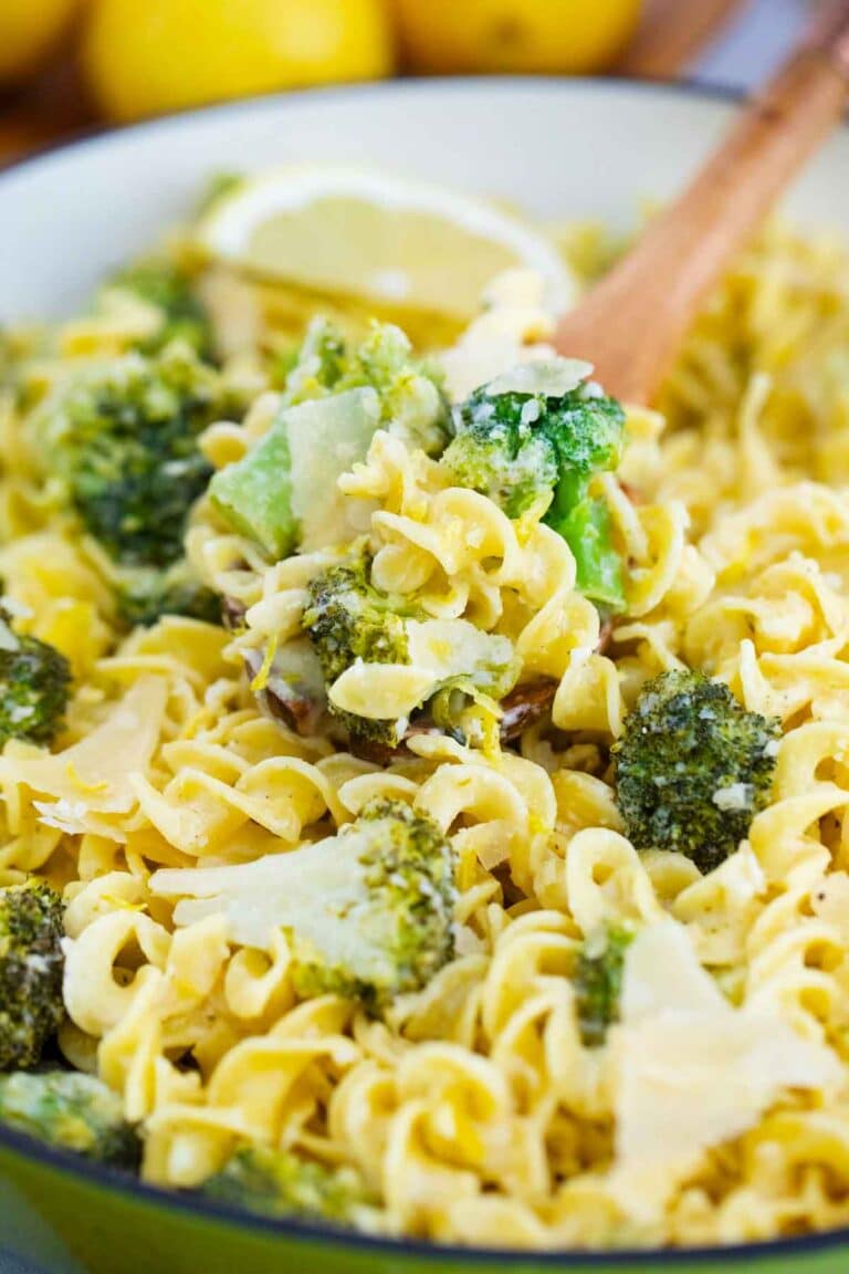 close shot of lemon broccoli pasta with a serving spoon in it