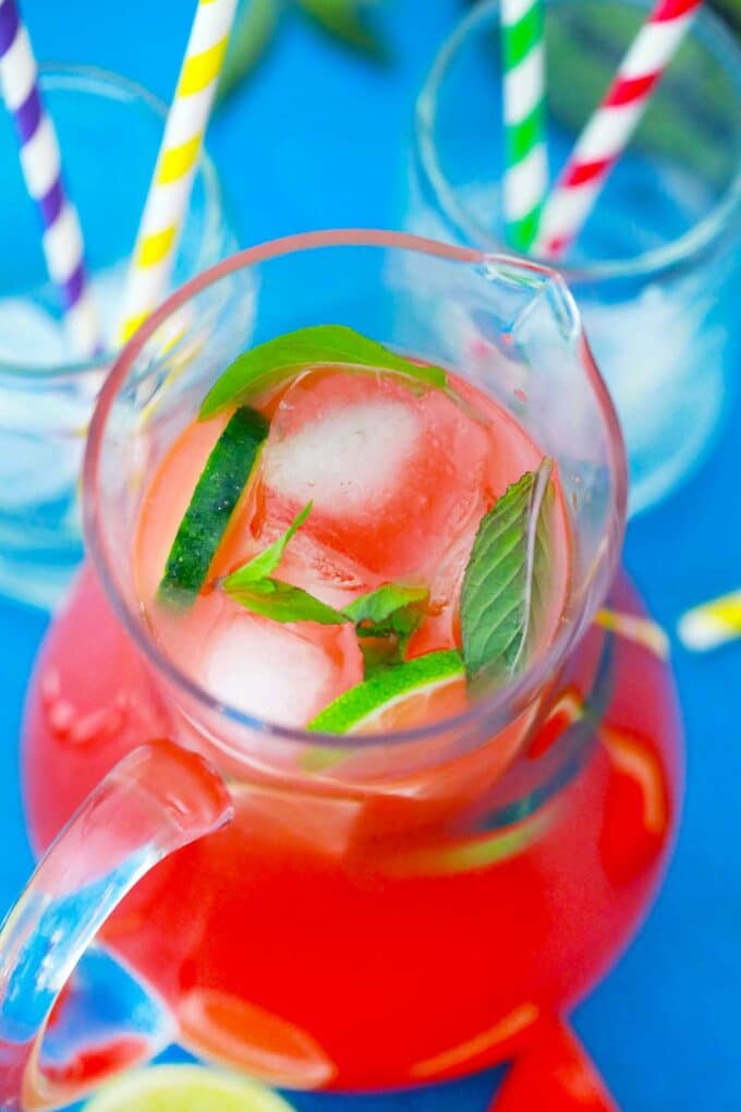 Overhead shot of a pitcher with boozy watermelon lemonade.
