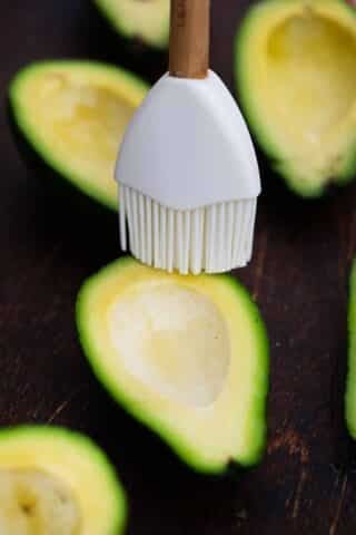 brushing the avocado with oil