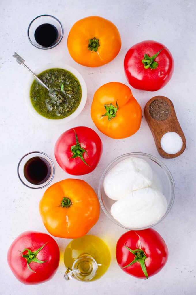 caprese salad ingredients arranged on a light surface