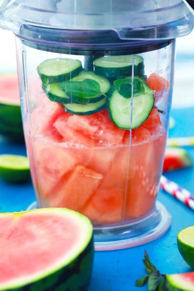 Boozy watermelon lemonade ingredients in a blender.