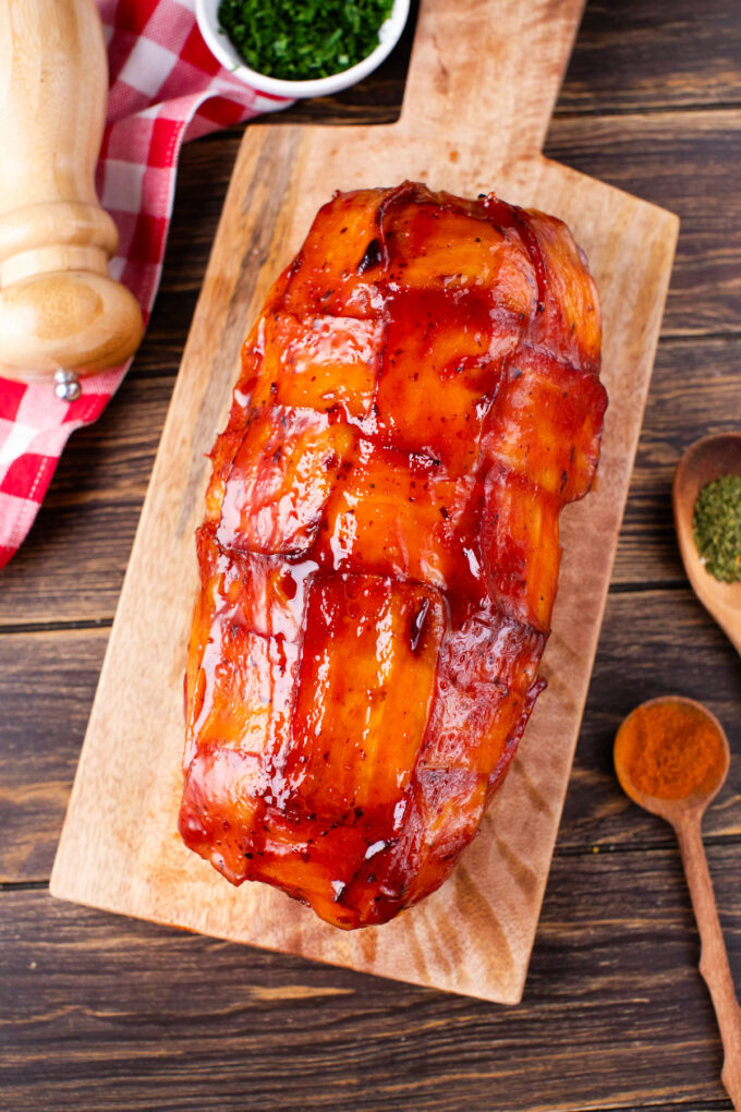 Overhead shot of bacon wrapped meatloaf covered with brown sugar glaze.