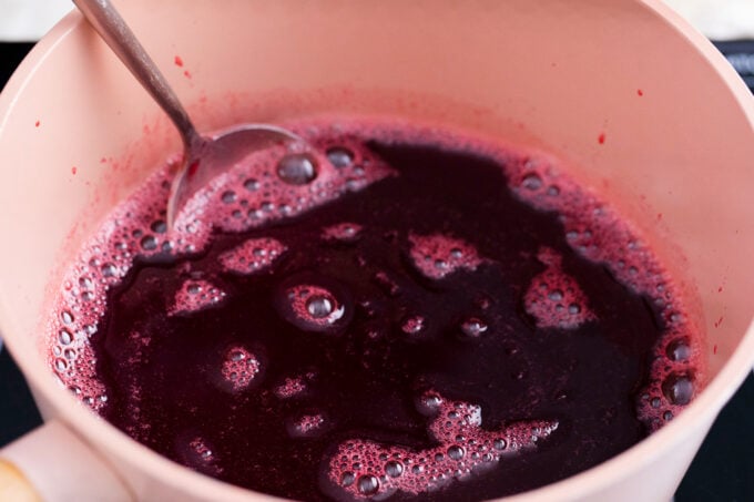Cherry sauce in a sauce pan.