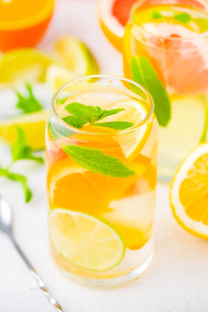 A glass of citrus detox water.