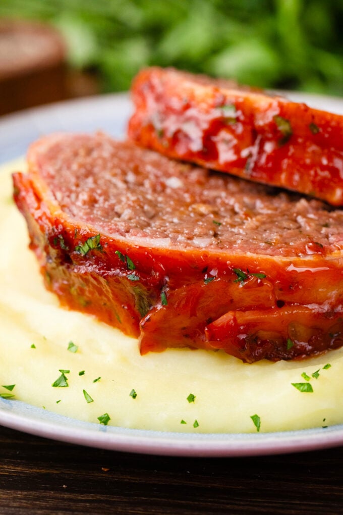 Close shot of tender and moist bacon wrapped meatloaf.