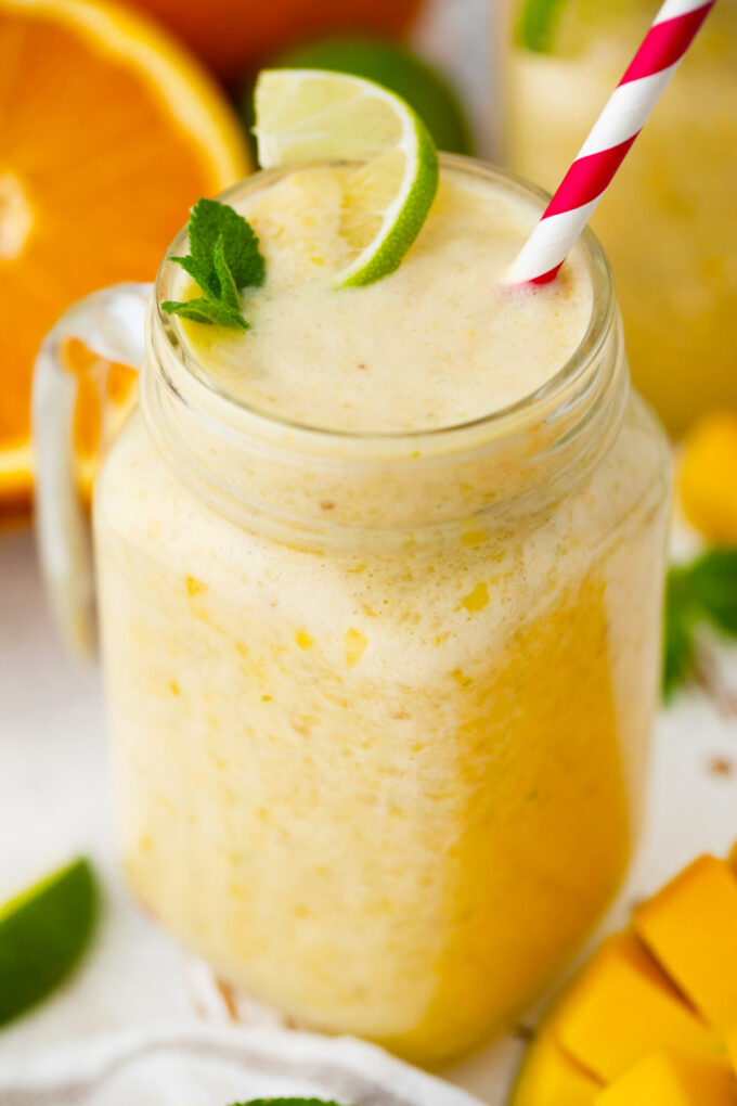Tropical smoothie with pineapple, mango, and lime.