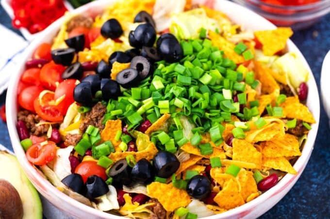 Ground beef taco salad ingredients in a bowl.