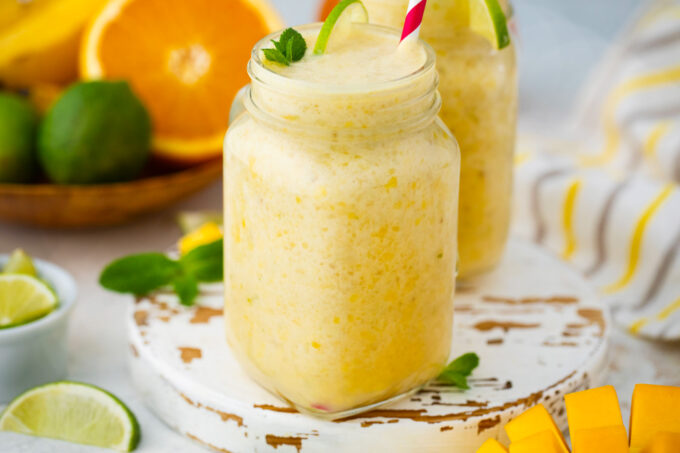 Creamy and refreshing, homemade tropical smoothie with pineapple and mango..