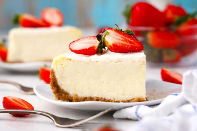 sliced Cheesecake Factory Original Cheesecake Copycat topped with strawberries