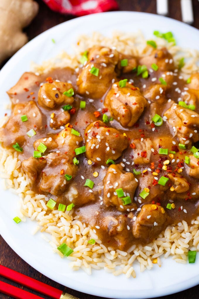 Saucy Instant Pot garlic sesame chicken over rice.