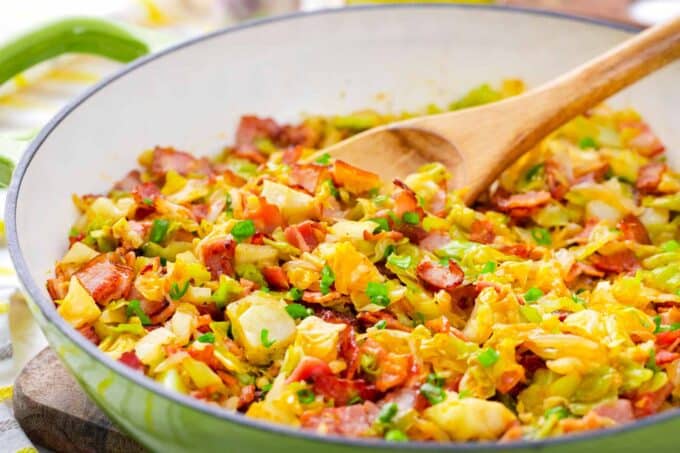 A skillet of bacon fried cabbage.