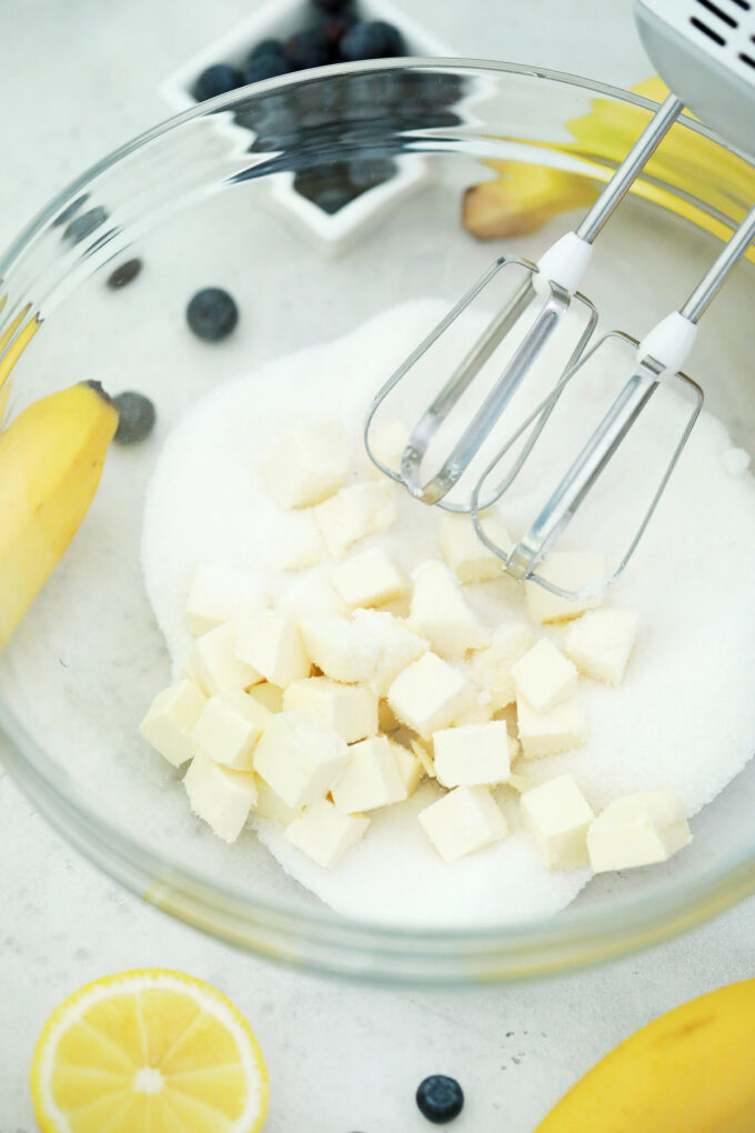 Beating butter and sugar.