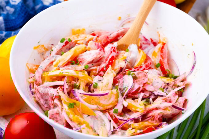 Creamy tomato salad made with red and yellow tomatoes.