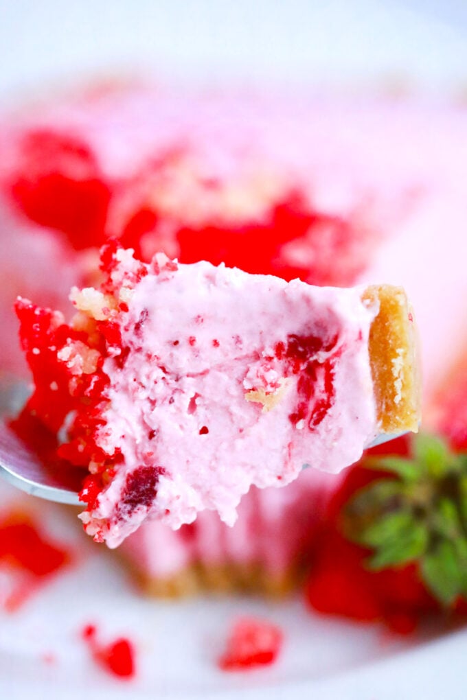 A bite of creamy strawberry shortcake pie.