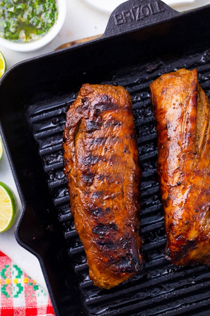 Grilled pork tenderloins in a grill pan.