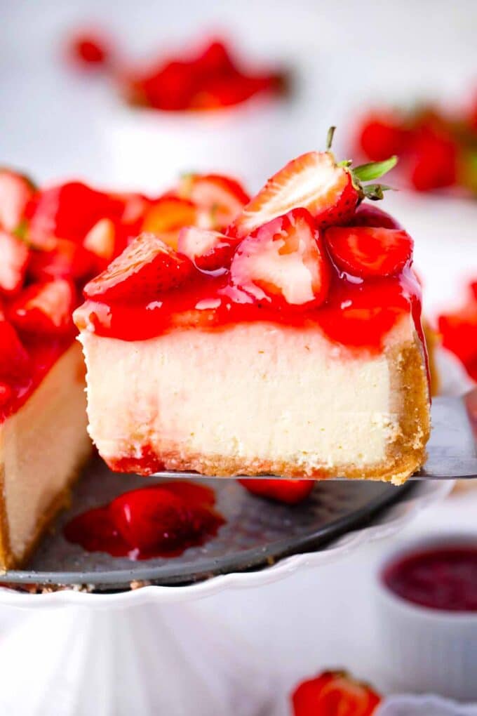 a slice of homemade cheesecake factory strawberry cheesecake