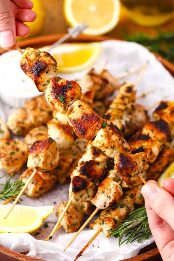 hand holding a keto Italian chicken skewer