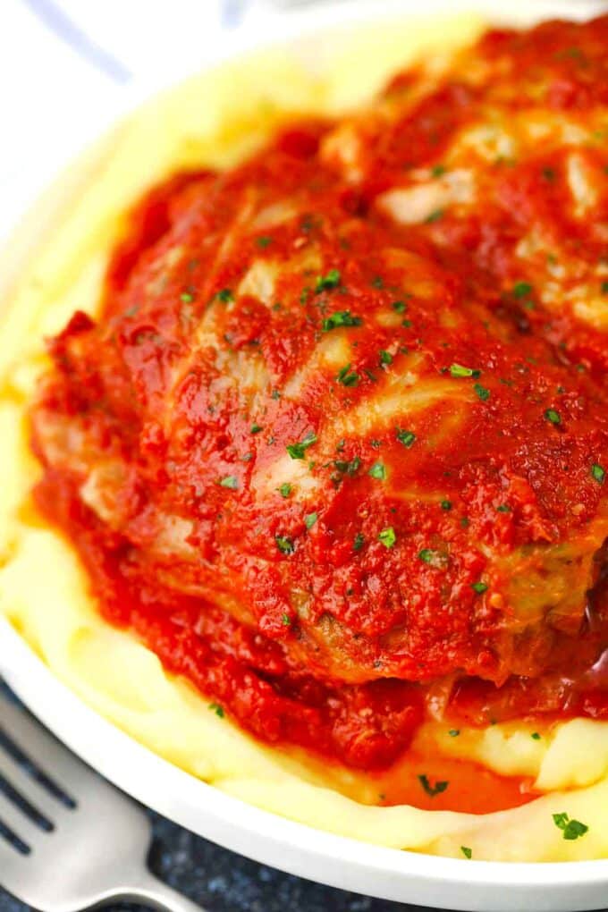 homemade stuffed cabbage rolls served with mashed potatoes