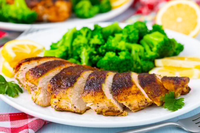 Homemade blackened chicken served with broccoli.