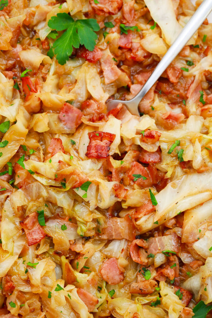 Homemade caramelized cabbage with bacon and onions.