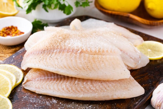 Seasoned tilapia fish fillets.