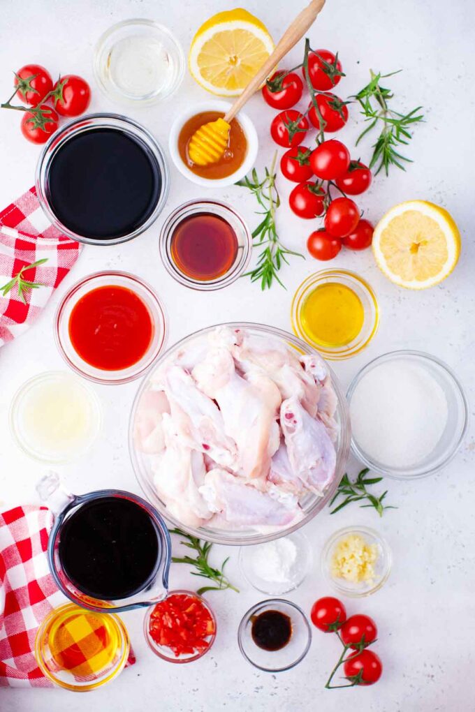 red wine glazed wings ingredients in bowls on a table