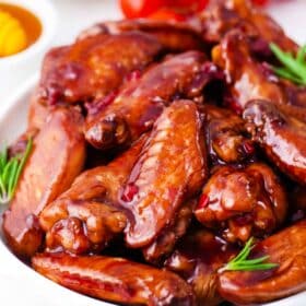 red wine glazed wings covered in a sticky wine glaze sauce