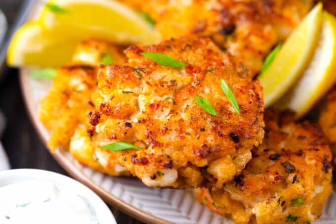 crispy shrimp cakes served with lemon wedges