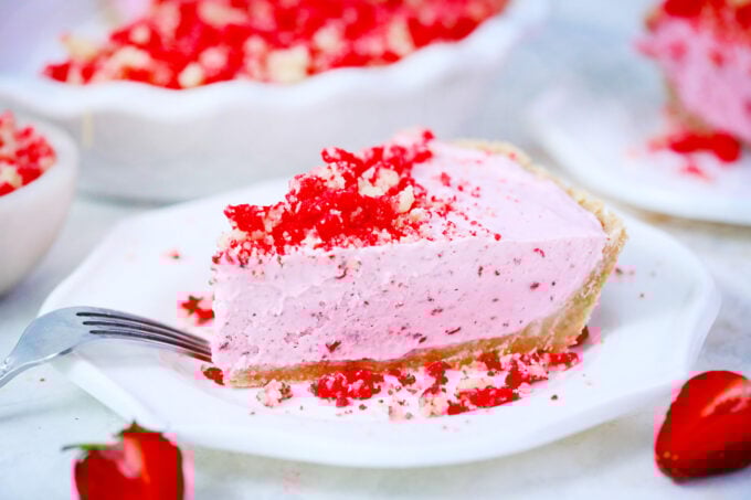 Freezer strawberry shortcake pie with strawberry crumb topping.