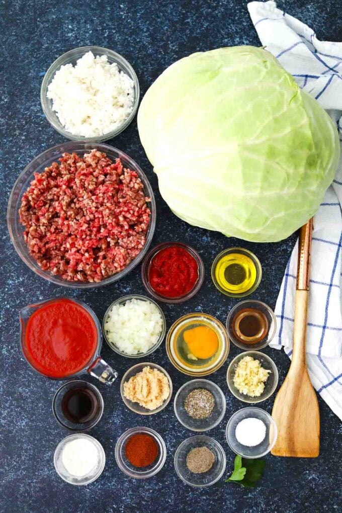 stuffed cabbage rolls ingredients in bowls on a table