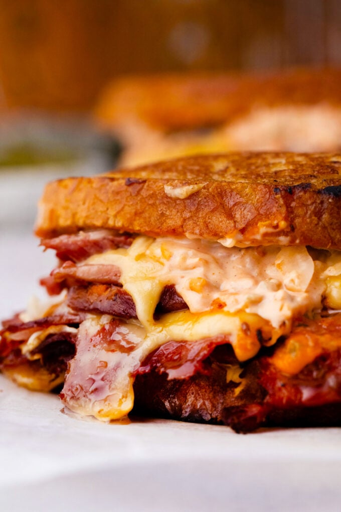 Cheesy homemade Reuben sandwiches with sauerkraut.