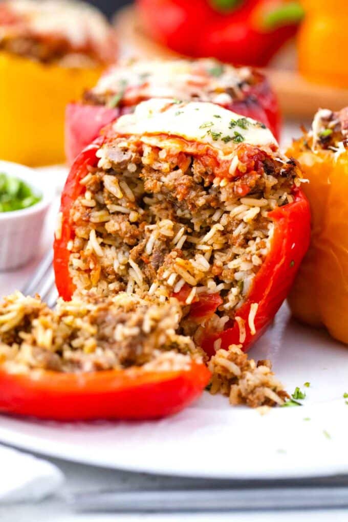 instant pot stuffed pepper sliced in two revealing meaty filling