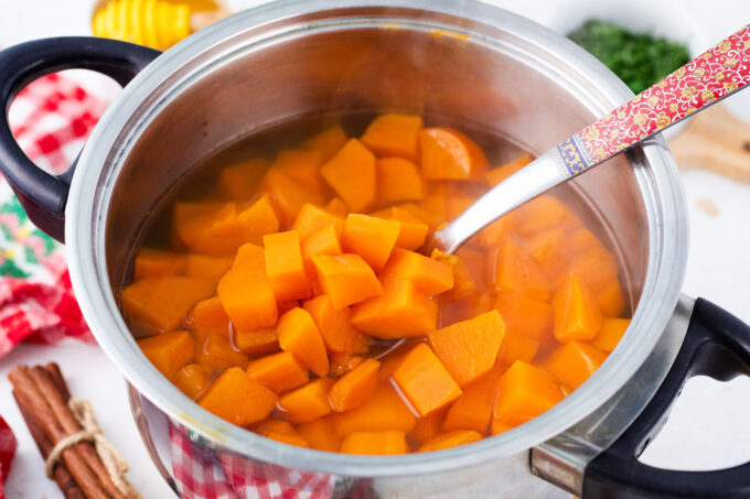 A pot of boiled sweet potato chunks.