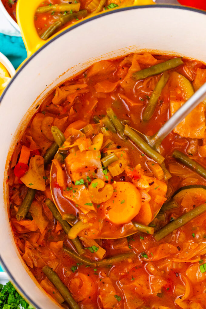 A ladle of cabbage soup.