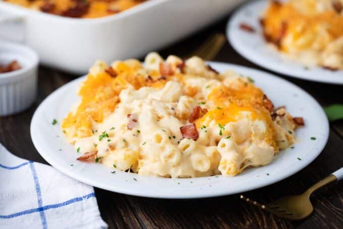 cheesy mac and cheese casserole topped with cheddar cheese