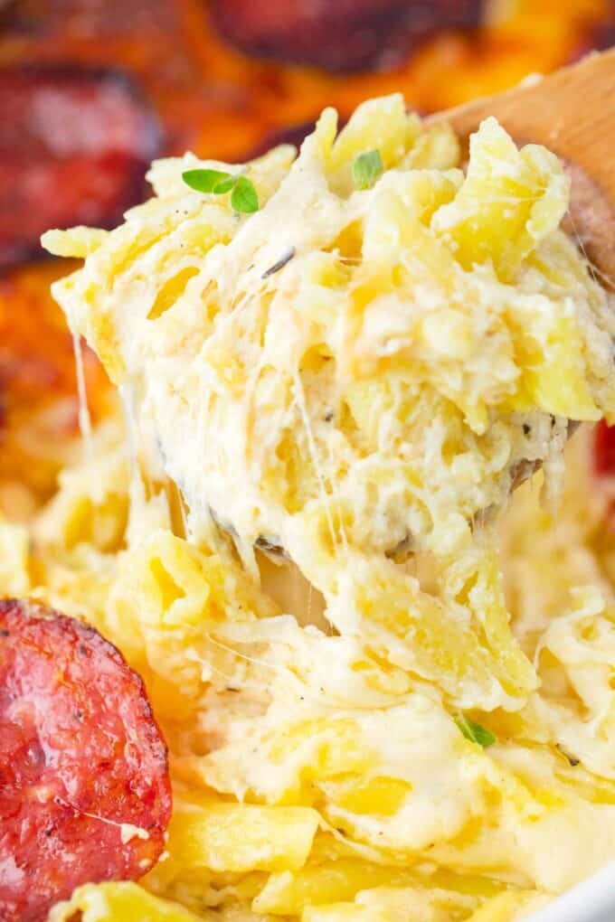 A cheesy spoonful of white pizza casserole.