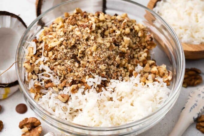 coconut flakes and pecans in a bowl