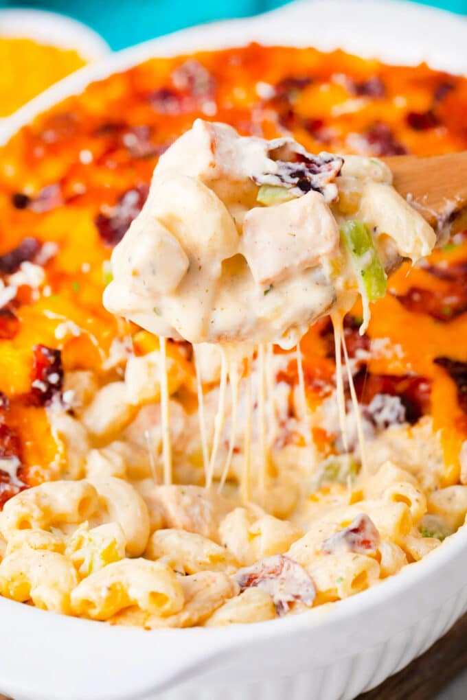 A spoonful of very cheesy cheesy crack chicken casserole.