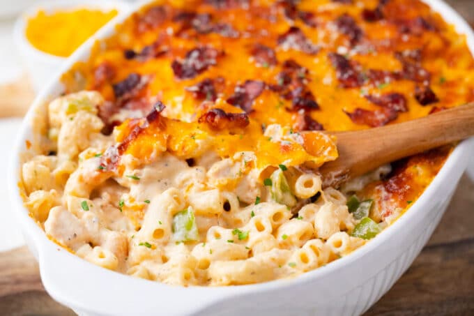 Creamy and cheesy cheesy crack chicken casserole made with pasta, chicken, veggies, and cheese.