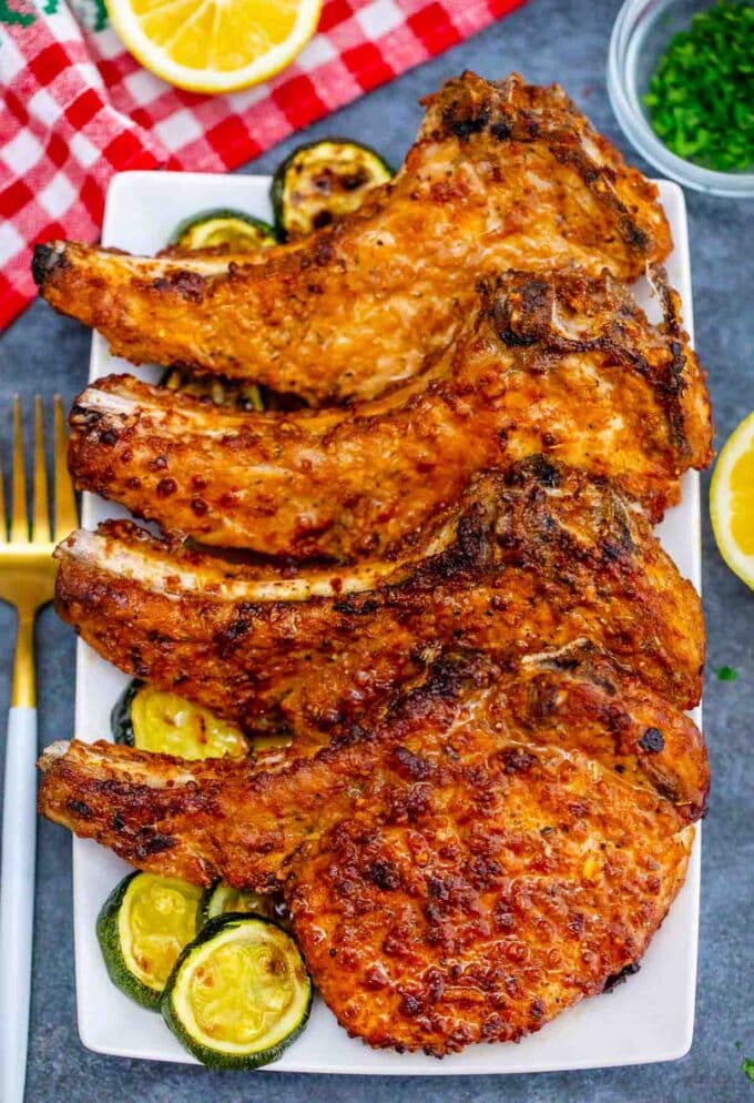 crispy air fryer pork chops arrange on a serving platter